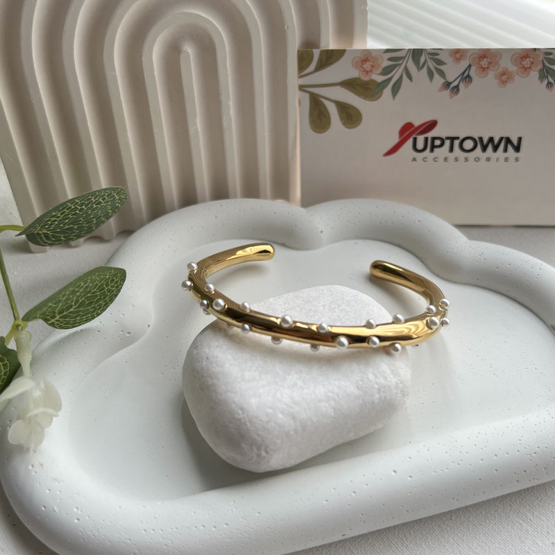 Gold cuff bracelet scattered with dainty white pearls – Pearl Speckle Cuff by Uptown Accessories