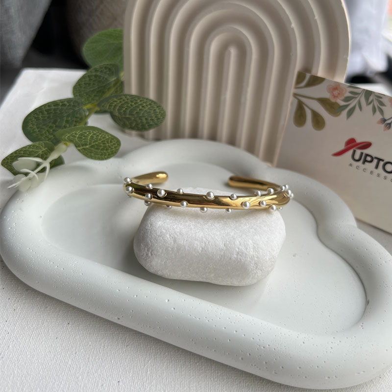 Gold cuff bracelet scattered with dainty white pearls – Pearl Speckle Cuff by Uptown Accessories
