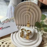 Gold silhouette charm necklace and convertible hoop earrings set – Sculptural Silhouette Set by Uptown Accessories